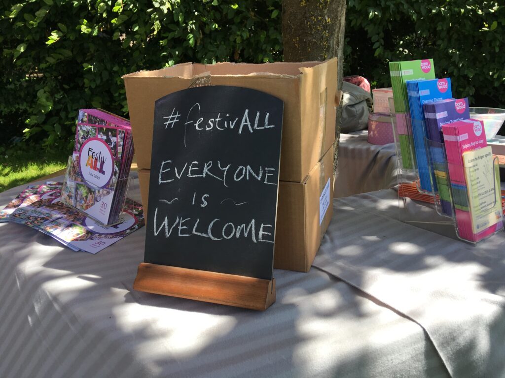 Blackboard saying everyone is welcme at Festivall